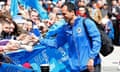 Wigan manager Roberto Martínez greets supporters prior to his team travelling to London