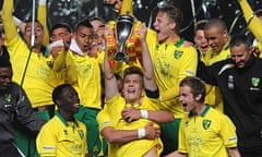 Norwich's Cameron McGeehan lifts the FA Youth Cup as his teammates celebrate the triumph
