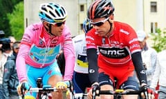 Overall leader Vincenzo Nibali, left, and the red jersey Cadel Evans let the breakaway take the stra