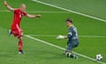 Bayern Munich's Arjen Robben shoots to score