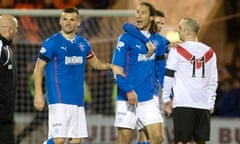 Bilel Mohsni, centre, is held back after being sent-off for Rangers after their 1-0 win at Airdrie