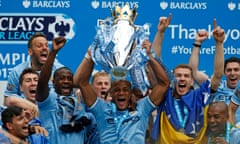 Vincent Kompany and his Manchester City team-mates lift last season's Premier League trophy. Can the