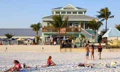 Beachgoers at Jimmy B's Beach Bar in Florida