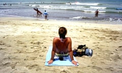 Traveller on a beach, Indonesia