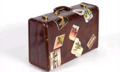 Old-fashioned suitcase with labels