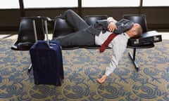 Jetlag: a man asleep in an airport