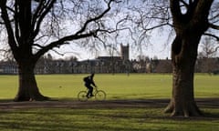 A cyclist on Jesus Green in Cambridge