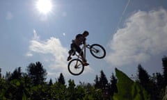 Freestyle rider James Risker takes to the air on a series of jumps at Dixon's Hollow at Dalby Forest