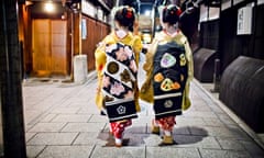 Two Geishas walking together in Kyoto.