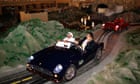 Visitors ride in miniature Ferrari cars at theme park Ferrari World in Abu Dhabi