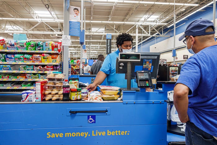 A customer at a Walmart checkout line