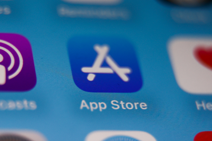 Apple's App Store icon is shown as a blue square with rounded edges and three overlapping white lines forming the letter A