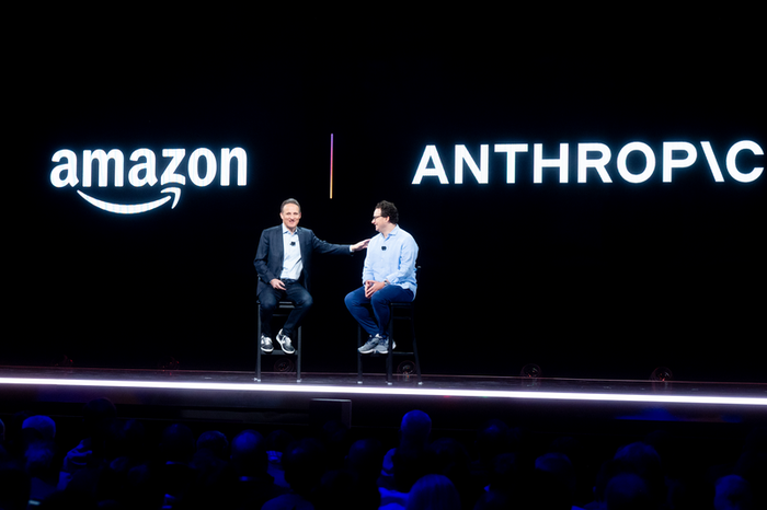 AWS CEO Adam Selipsky talks to Anthropic CEO Dario Amodei on stage at Amazon's re:Invent 2023 conference.