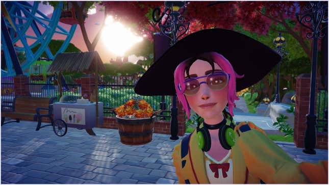 Un personaje jugador en Disney Dreamlight Valley se toma una selfie frente a un parque.