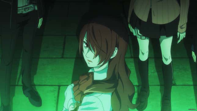 Mitsuru faces a glowing green light.