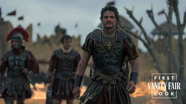 Pedro Pascal walks toward the camera wearing a gladiator costume.