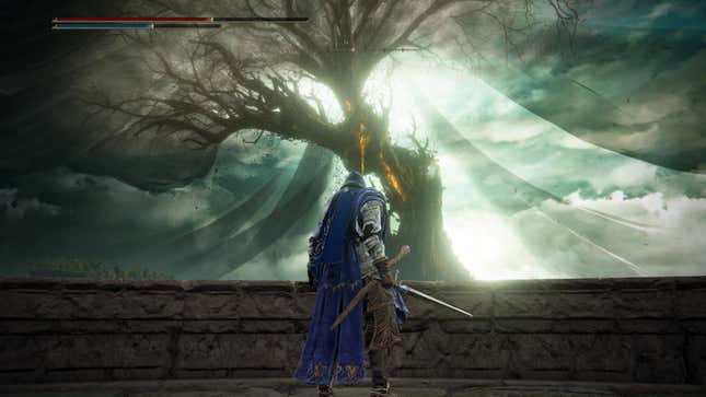 The player character of Elden Ring stands before an epic tree.