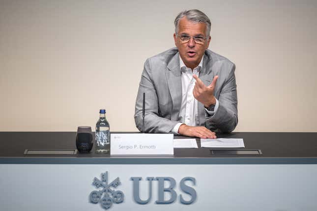 UBS CEO Sergio Ermotti speaking at press conference. 