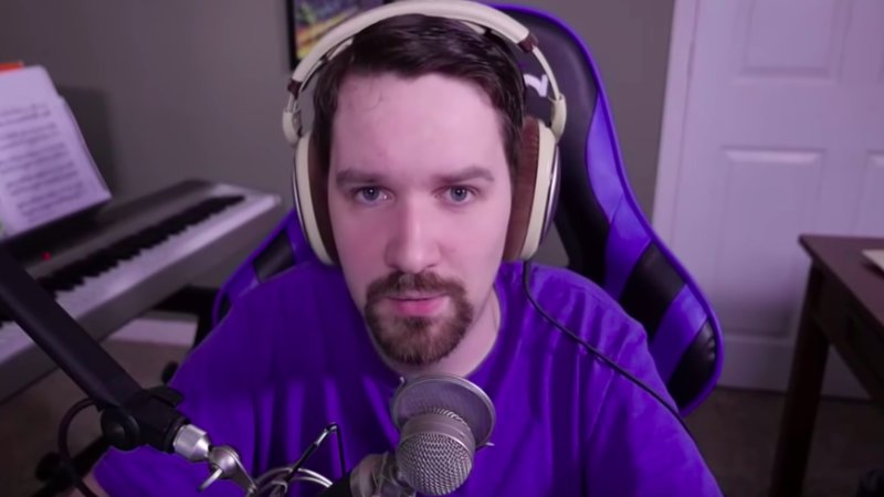 Steven Kenneth Bonnell II wearing headphones and speaking to a mic