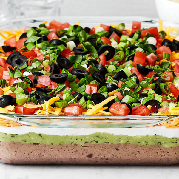 7 layer dip next to cilantro