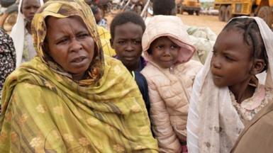 Buthaina and her children at a camp in Adré, Chad