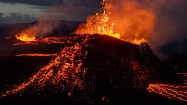 Lava spews from multiple craters of the Sundhnúkur volcano on June 3, 2024 on the Reykjanes peninsula near Grindavik, Iceland. 