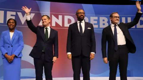 Conservative Party Leadership candidates Kemi Badernoch, Robert Jenrick, James Cleverly and Tom Tugendhat pose on stage during the final day of the Conservative Party Conference in Birmingham, Britain, 02 October 2024