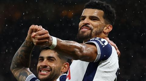 Dominic Solanke celebrates after scoring for Tottenham at Manchester United