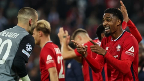 Lille players celebrate