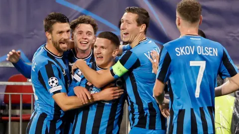 Club Brugge players celebrate