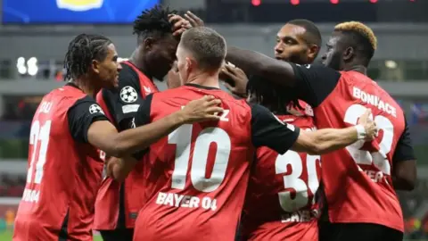 Bayer Leverkusen players celebrate