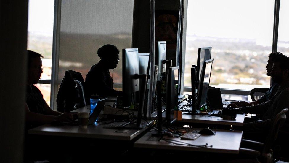 Facebook moderators working at its offices in Austin, Texas