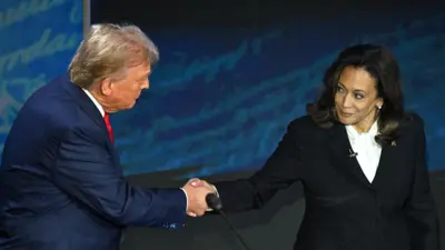 Trump and Harris shake hands in the debate