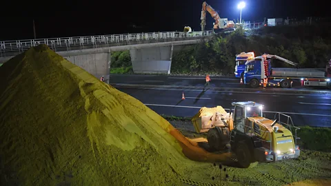 Getty Images Creating the buildings and roads needed for the world's growing urban population requires vast volumes of sand (Credit: Getty Images)