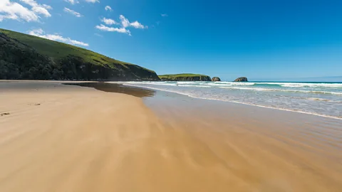 Alamy Sand-covered beaches are often depicted as paradise, but in some parts of the world they are being dug up and sold by the tonne (Credit: Alamy)