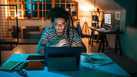 Getty Images Man working late at night