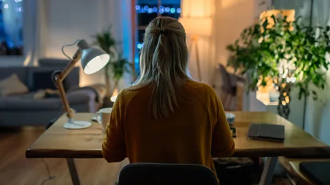 Getty Images Some people choose to work a block of hours later at night, while others choose to put more work in during the mornings (Credit: Getty Images)