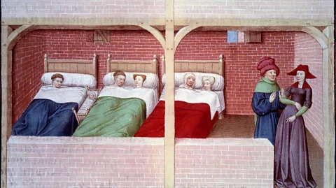 Getty Images A medieval dormitory, as depicted in 1450 (Credit: Getty Images)