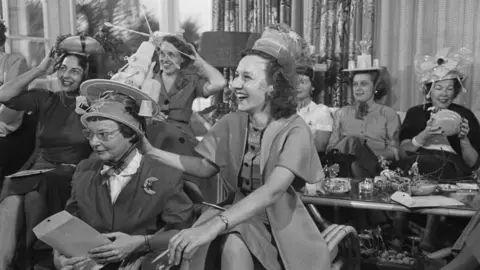 Getty Images Women at a Tupperware party in the 1950s