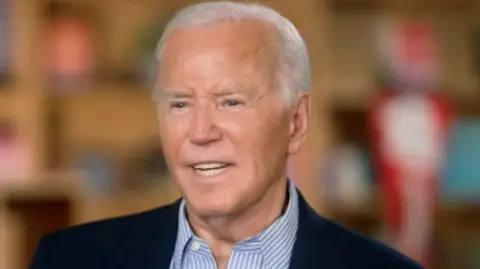 Joe Biden with his mouth slightly open during ABC interview