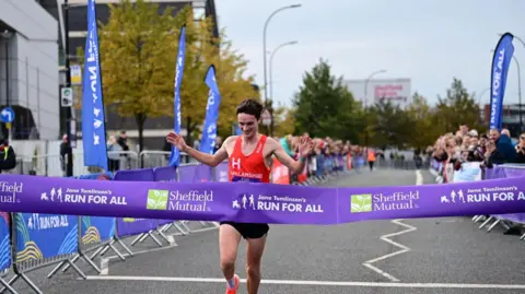 Winner Andrew Heyes crossing the finish line