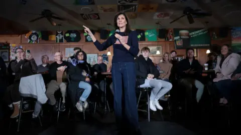 Getty Images Republican presidential candidate and former UN Ambassador Nikki Haley speaks during a campaign event at Mickey's Irish Pub on January 09, 2024 in Waukee, Iowa