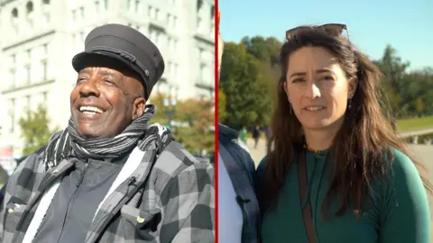 One a man laughing wearing a scarf and a woman with a confused expression