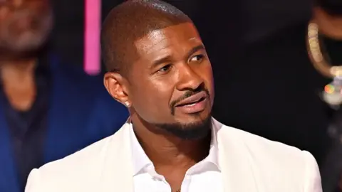 Usher accepts the Lifetime Achievement Award onstage at the the 2024 BET Awards at Peacock Theater on June 30, 2024 in Los Angeles, California.