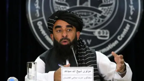 Taliban's government spokesperson Zabiullah Mujahid talks with journalists during a press conference in Kabul, Afghanistan, 29 June 2024