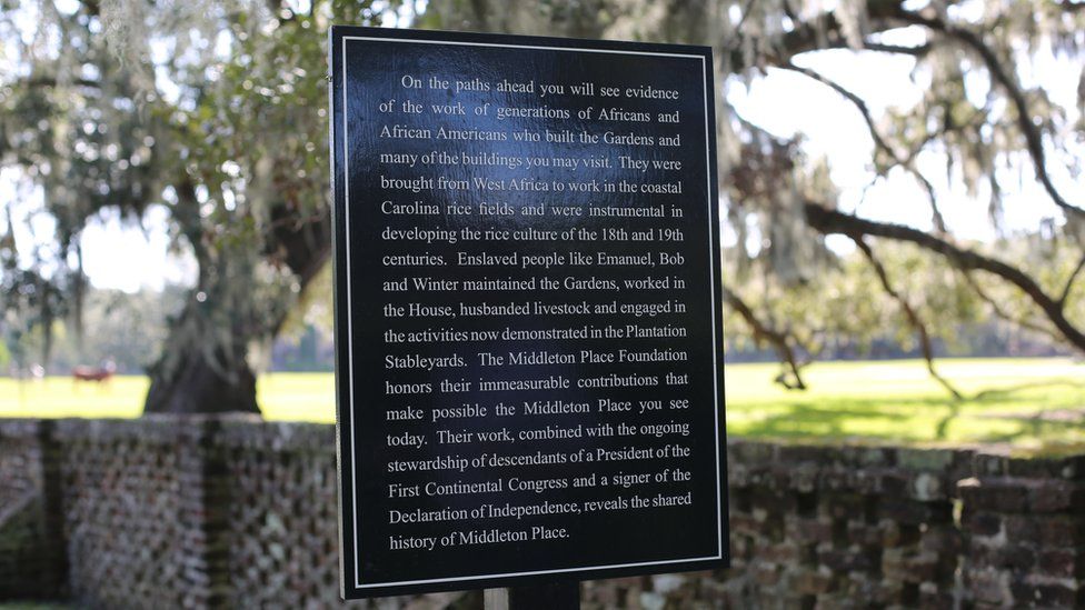 Sign mentioning "enslaved labour" at the entrance of Middleton