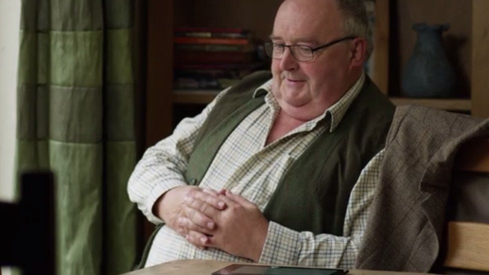 Man sitting at table