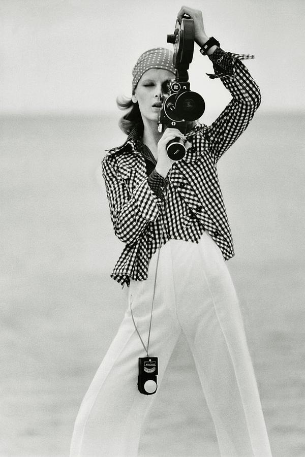 A Model Looking Through A Beaulieu Camera Wearing Photograph by Gianni Penati