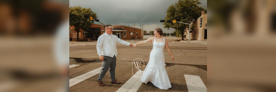 See it: Funnel cloud photobombs Nebraska newlyweds
