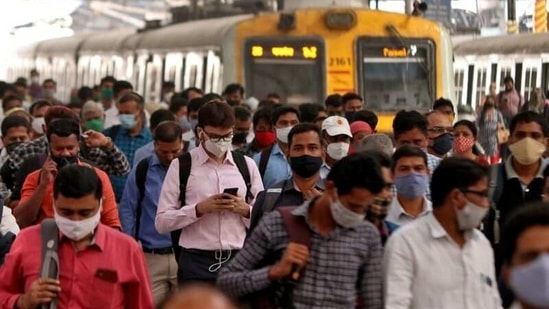 Commuters at Chhatrapati Shivaji Maharaj Terminus (CSMT), in Mumbai, on March 16. Days after the Central team’s visit to six Maharashtra districts and municipal corporations, the state government said it is witnessing a second wave of Covid-19 infections.(Niharika Kulkarni / REUTERS)